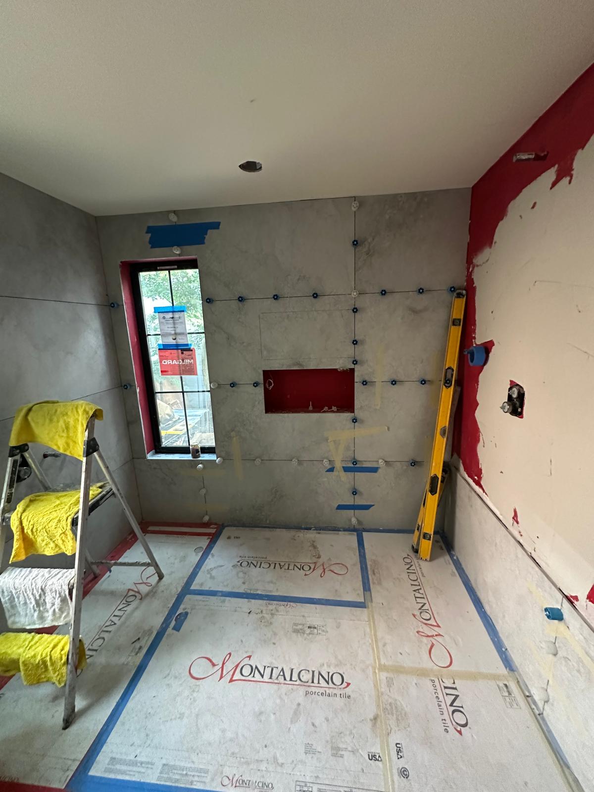 Bathroom remodel - tile layout begins